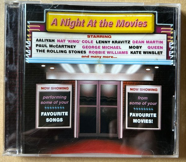 A NIGHT AT THE MOVIES-Queen,Robbie Williams,Kate Winslet,R.Kelly,Moby,